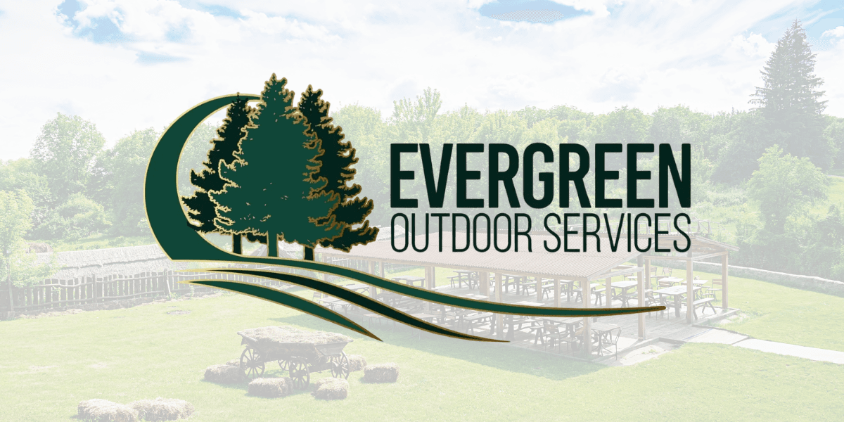 Evergreen Outdoor Services logo over park pavilion and green landscape background with trees and picnic area.