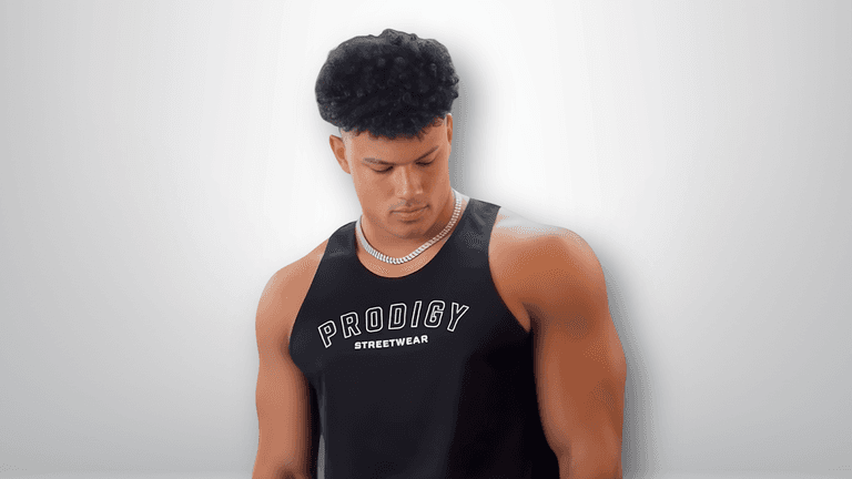"Trey Bailey, founder of Prodigy Streetwear, inspiring global growth through fitness and ambition, featuring the 'Mentality Drop' collection."