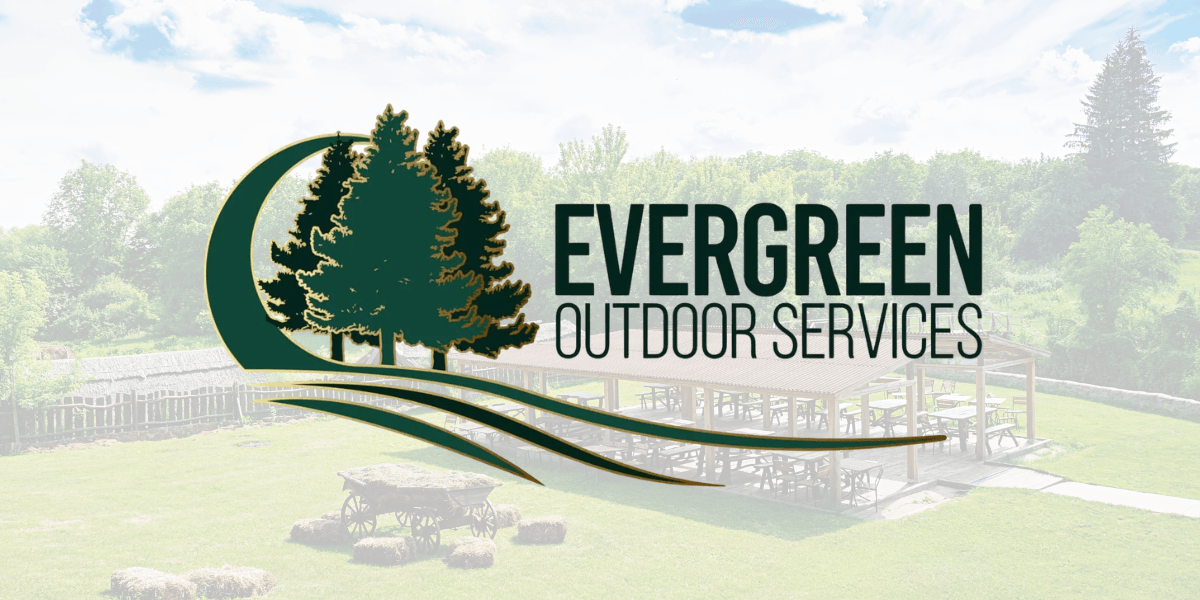 Evergreen Outdoor Services logo over park pavilion and green landscape background with trees and picnic area.