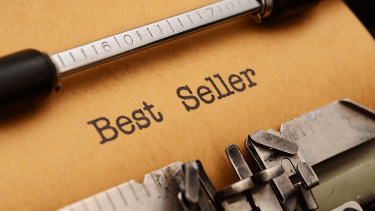 Close-up of a typewriter with paper showing the words Best Seller typed on it