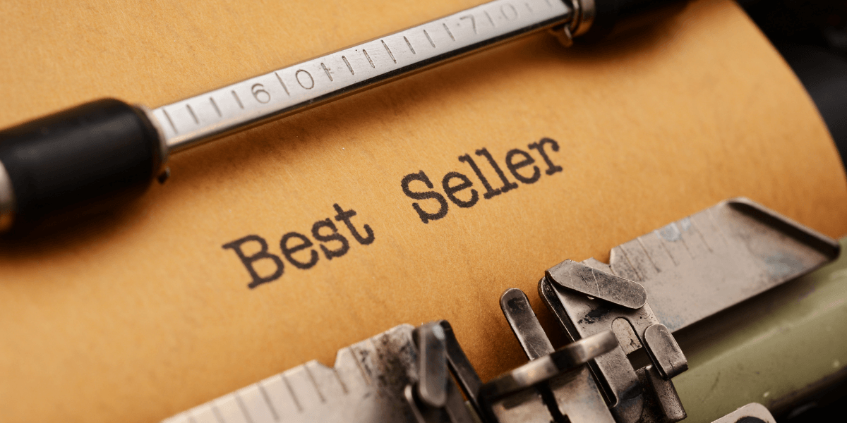 Close-up of a typewriter with paper showing the words Best Seller typed on it